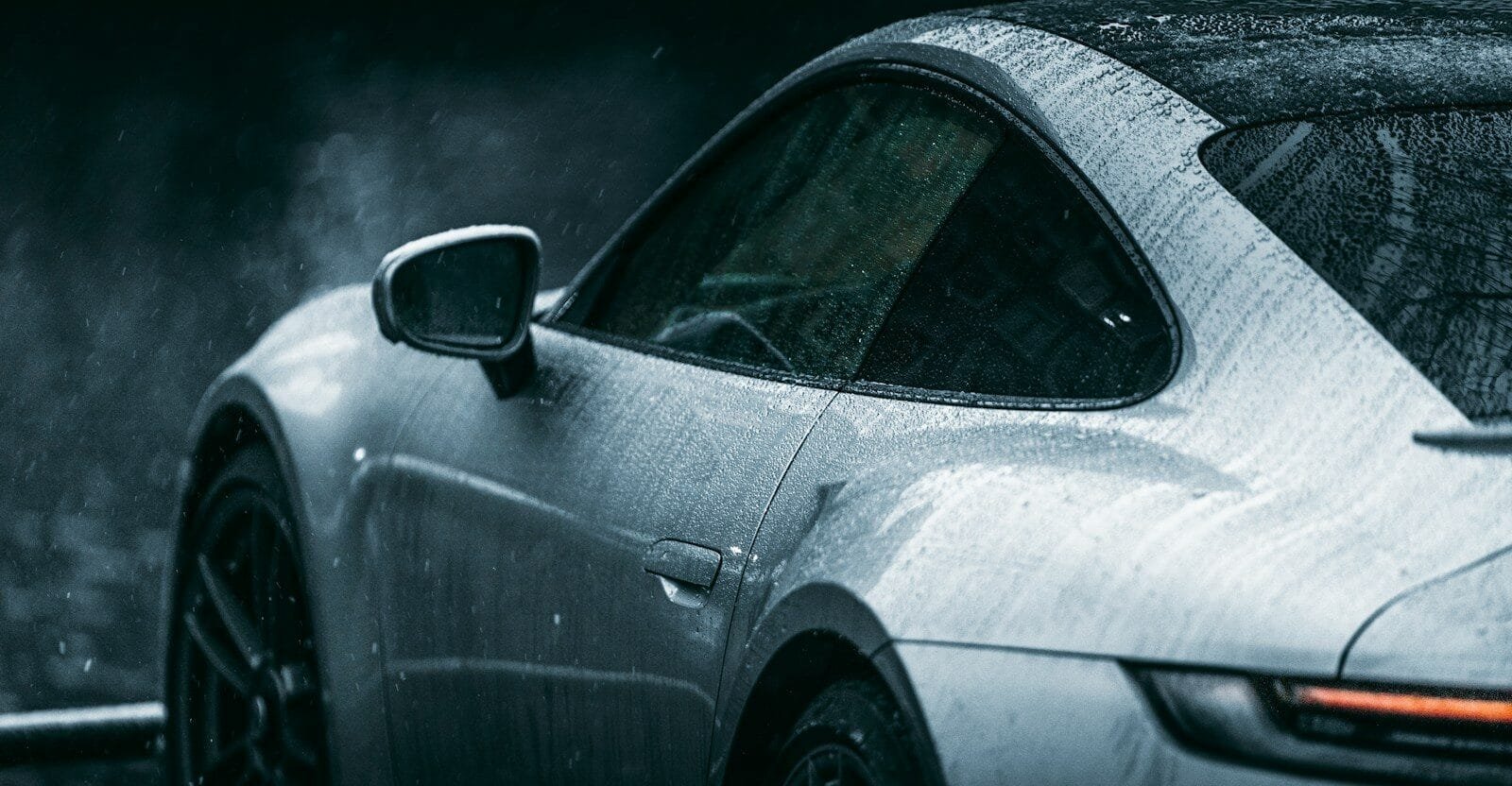 grayscale photo of car on road